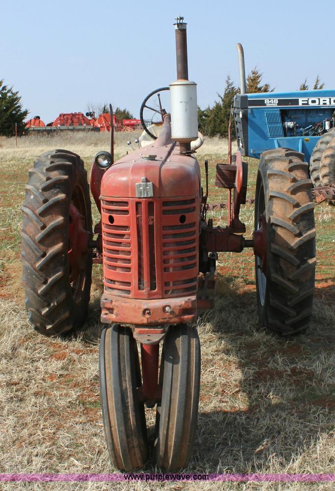 image for item 6901 International Farmall 300 tractor with attachments