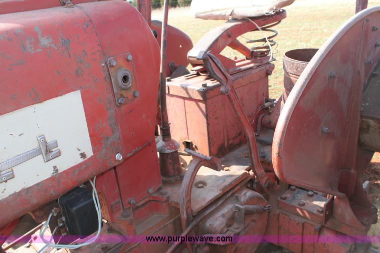 image for item 6901 International Farmall 300 tractor with attachments