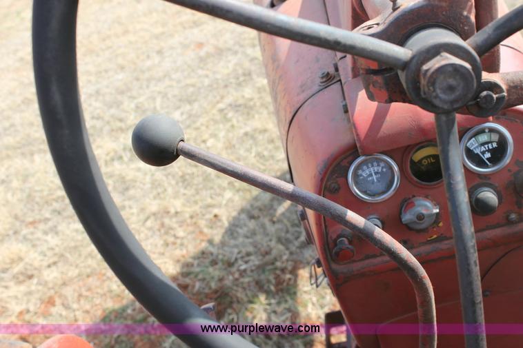 image for item 6901 International Farmall 300 tractor with attachments