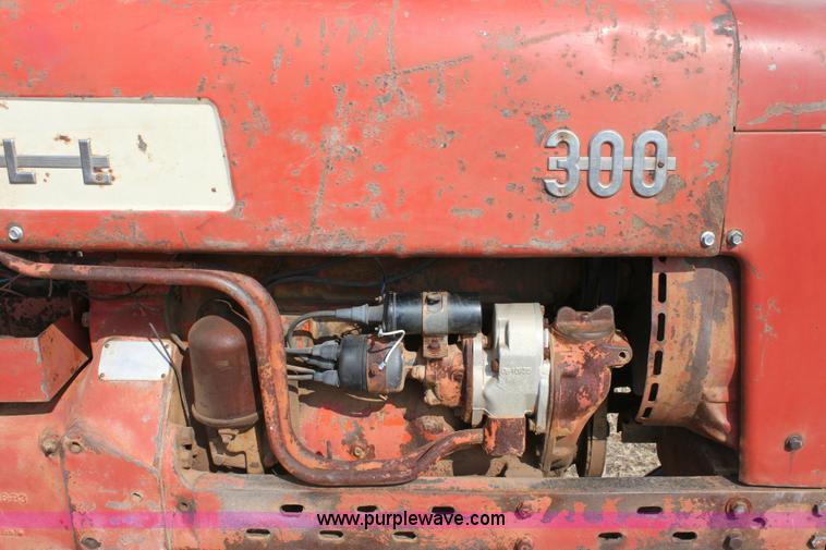 image for item 6901 International Farmall 300 tractor with attachments