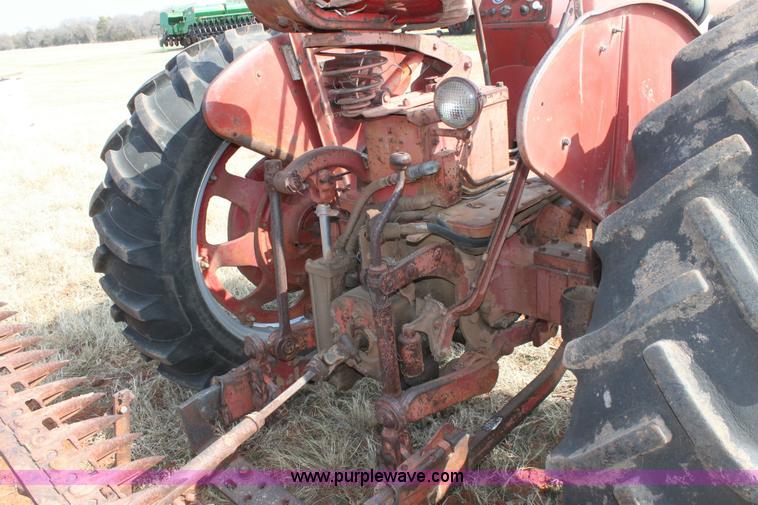 image for item 6901 International Farmall 300 tractor with attachments