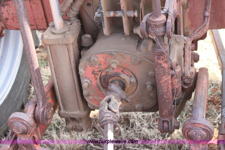 image for item 6901 International Farmall 300 tractor with attachments