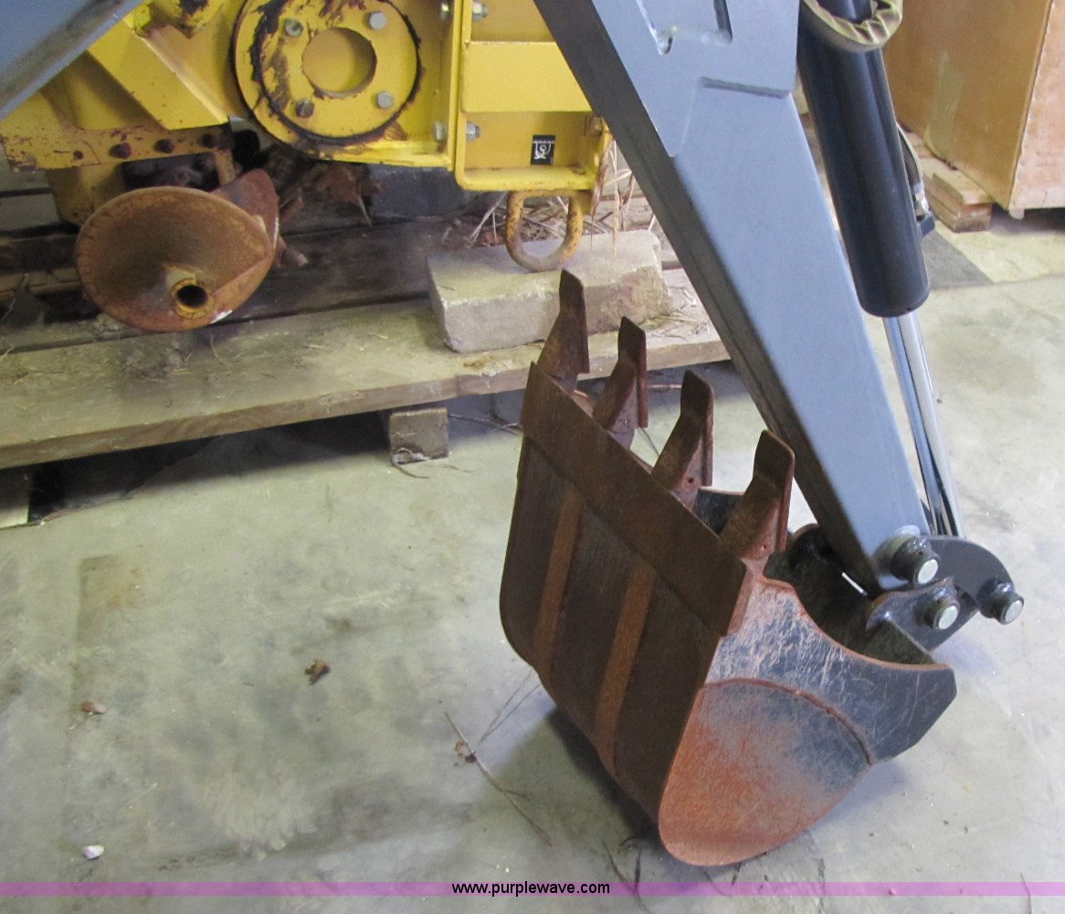 Erskine GX 920 backhoe skid steer attachment in Brookline, MO Item