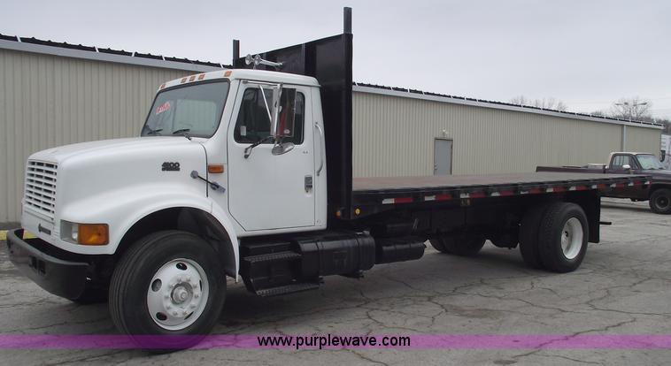 image for item 5451 2000 International 4900 dump flat bed truck