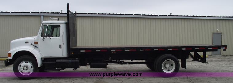 image for item 5451 2000 International 4900 dump flat bed truck