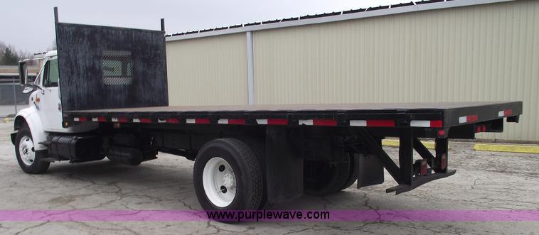 image for item 5451 2000 International 4900 dump flat bed truck