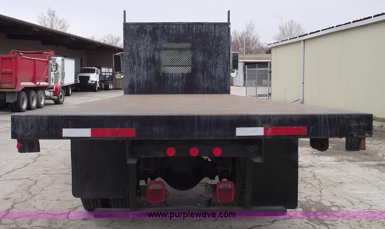 image for item 5451 2000 International 4900 dump flat bed truck