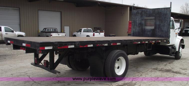 image for item 5451 2000 International 4900 dump flat bed truck