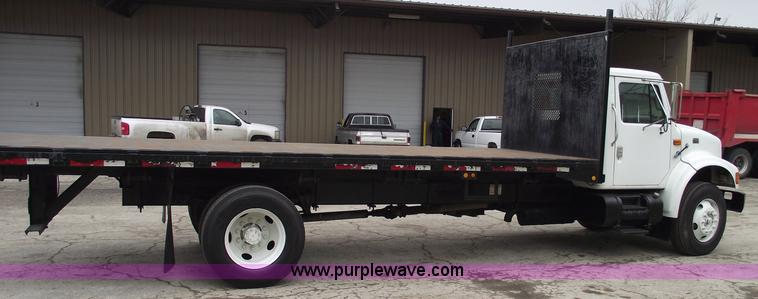 image for item 5451 2000 International 4900 dump flat bed truck