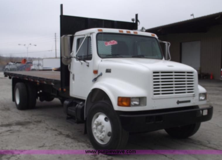 image for item 5451 2000 International 4900 dump flat bed truck
