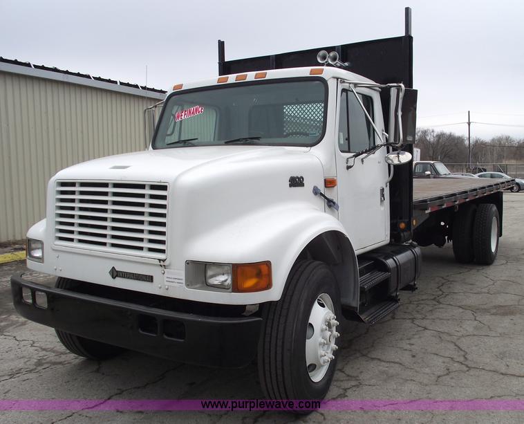 image for item 5451 2000 International 4900 dump flat bed truck