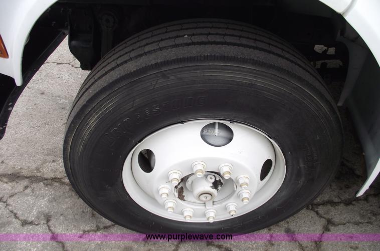 image for item 5451 2000 International 4900 dump flat bed truck