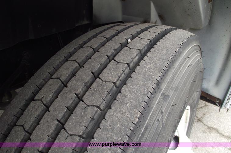 image for item 5451 2000 International 4900 dump flat bed truck