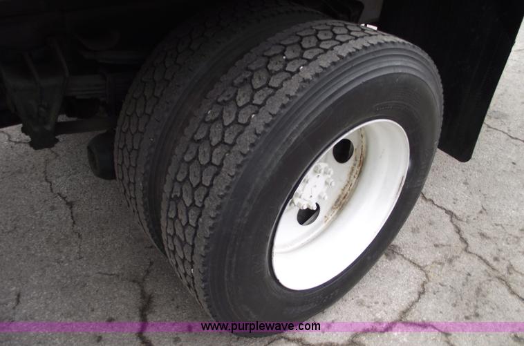 image for item 5451 2000 International 4900 dump flat bed truck