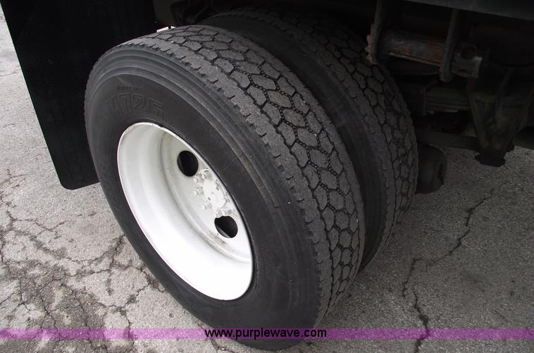 image for item 5451 2000 International 4900 dump flat bed truck