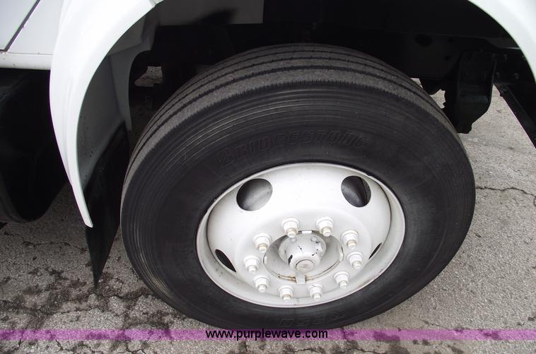 image for item 5451 2000 International 4900 dump flat bed truck