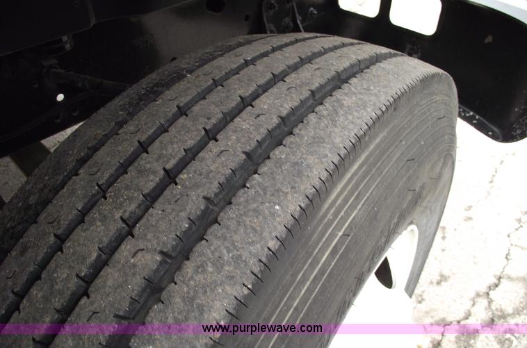 image for item 5451 2000 International 4900 dump flat bed truck