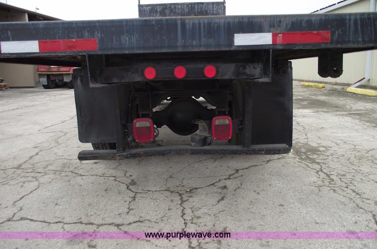 image for item 5451 2000 International 4900 dump flat bed truck