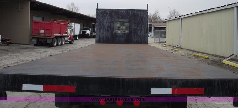 image for item 5451 2000 International 4900 dump flat bed truck