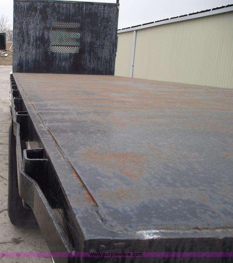 image for item 5451 2000 International 4900 dump flat bed truck