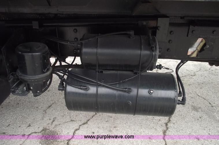 image for item 5451 2000 International 4900 dump flat bed truck