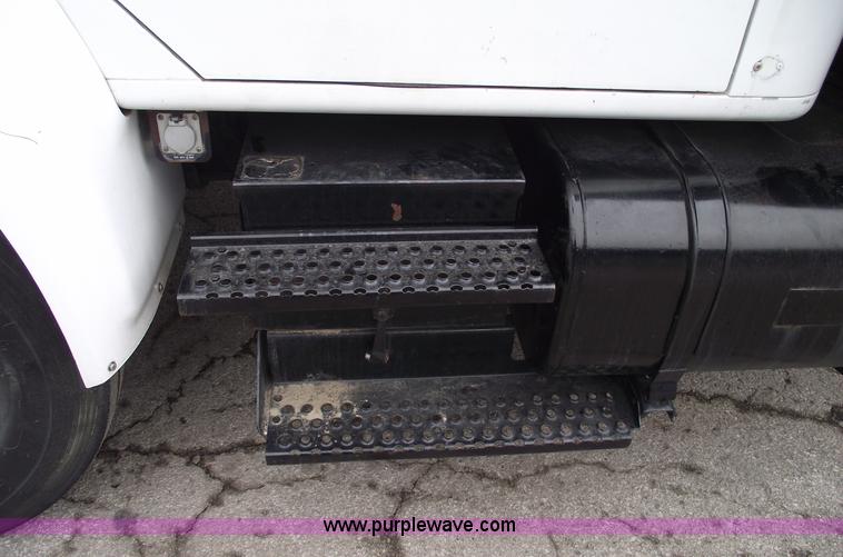 image for item 5451 2000 International 4900 dump flat bed truck