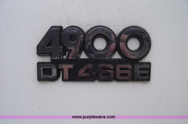 image for item 5451 2000 International 4900 dump flat bed truck