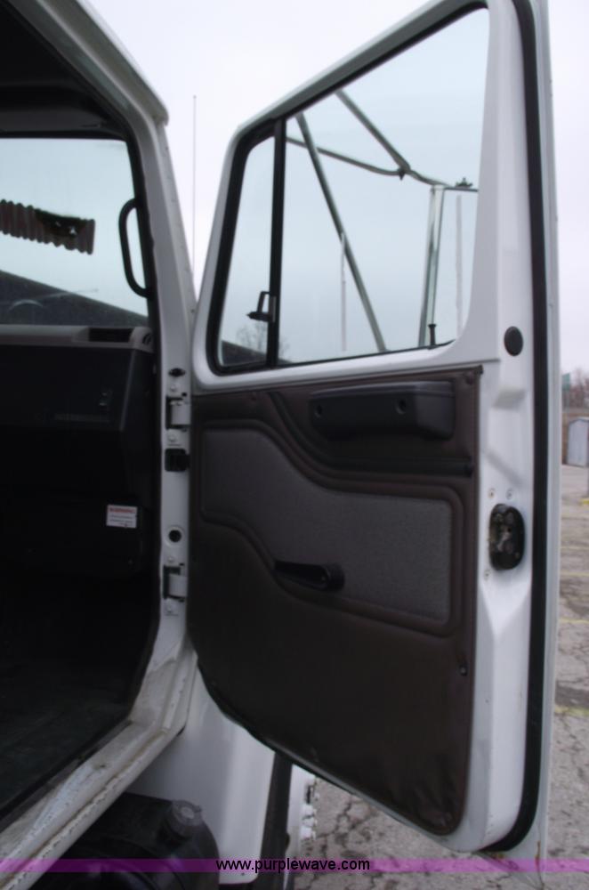 image for item 5451 2000 International 4900 dump flat bed truck