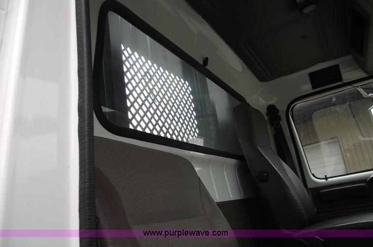 image for item 5451 2000 International 4900 dump flat bed truck