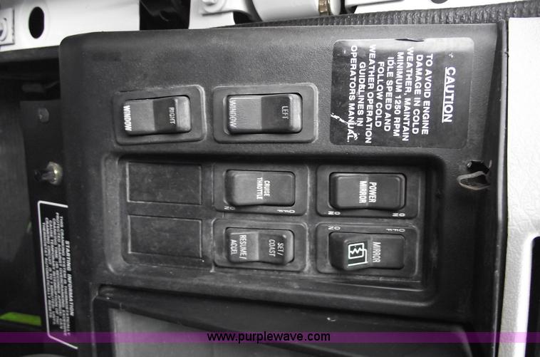 image for item 5451 2000 International 4900 dump flat bed truck