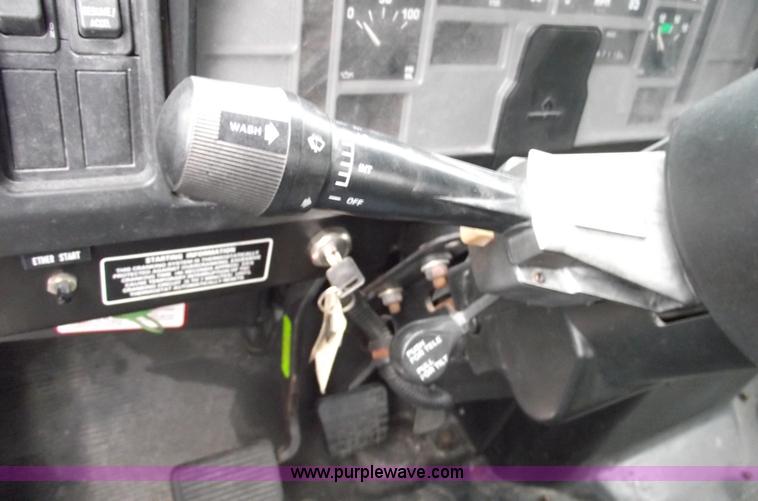 image for item 5451 2000 International 4900 dump flat bed truck