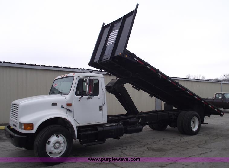 image for item 5451 2000 International 4900 dump flat bed truck