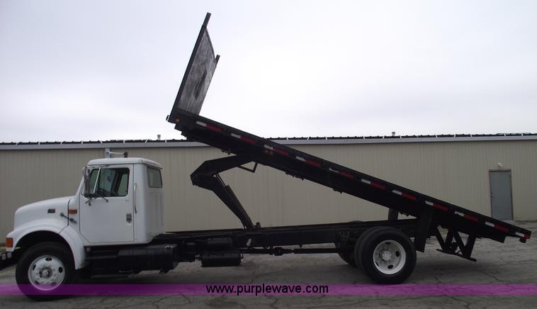 image for item 5451 2000 International 4900 dump flat bed truck