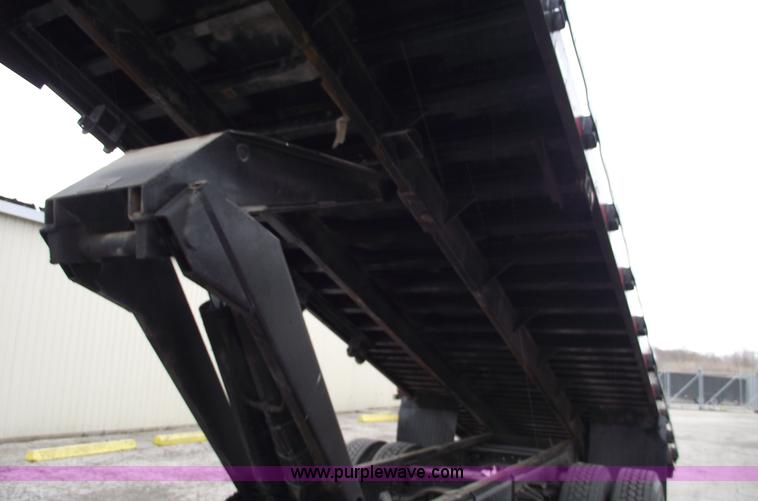 image for item 5451 2000 International 4900 dump flat bed truck