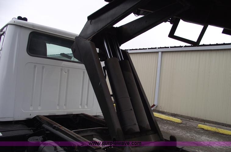 image for item 5451 2000 International 4900 dump flat bed truck