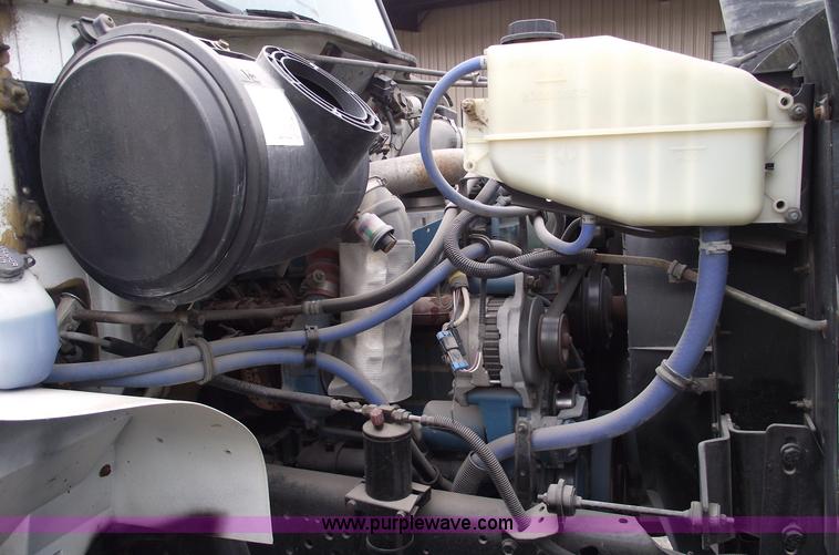 image for item 5451 2000 International 4900 dump flat bed truck