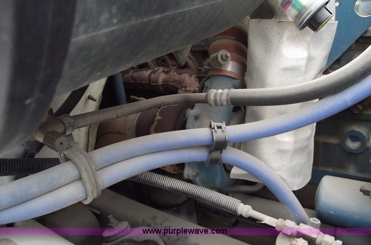 image for item 5451 2000 International 4900 dump flat bed truck