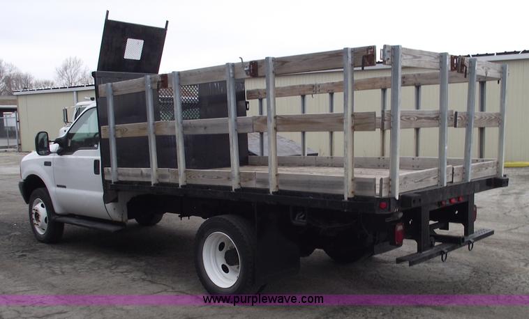 image for item 5452 1999 F450 XL Super Duty flat bed truck