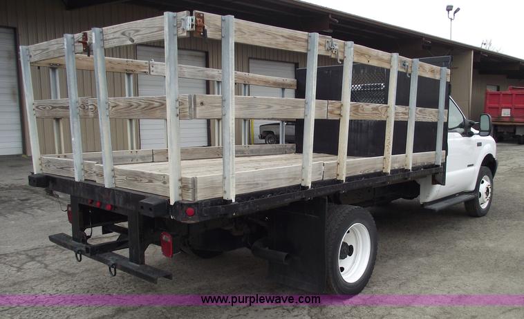 image for item 5452 1999 F450 XL Super Duty flat bed truck