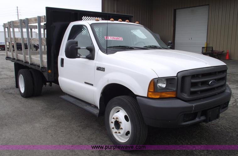 image for item 5452 1999 F450 XL Super Duty flat bed truck