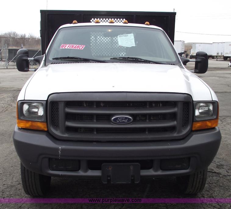 image for item 5452 1999 F450 XL Super Duty flat bed truck