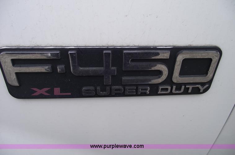 image for item 5452 1999 F450 XL Super Duty flat bed truck