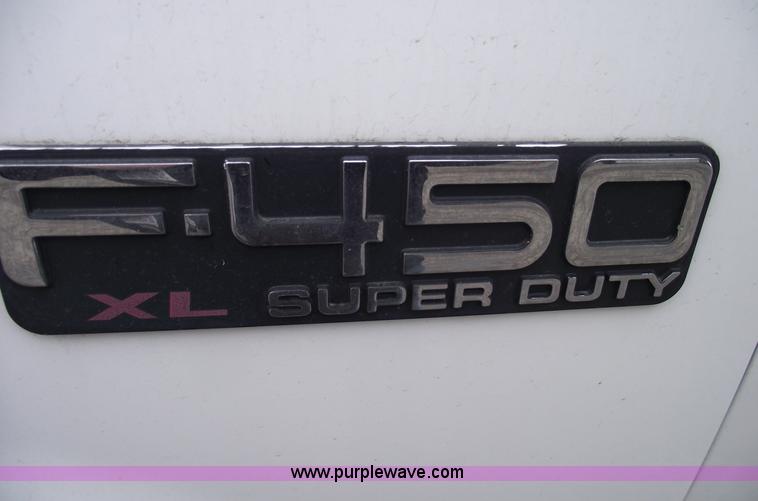 image for item 5452 1999 F450 XL Super Duty flat bed truck