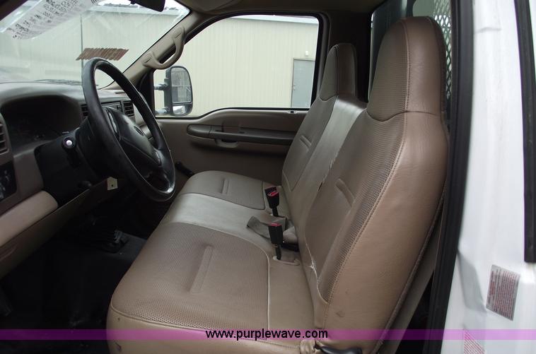 image for item 5452 1999 F450 XL Super Duty flat bed truck