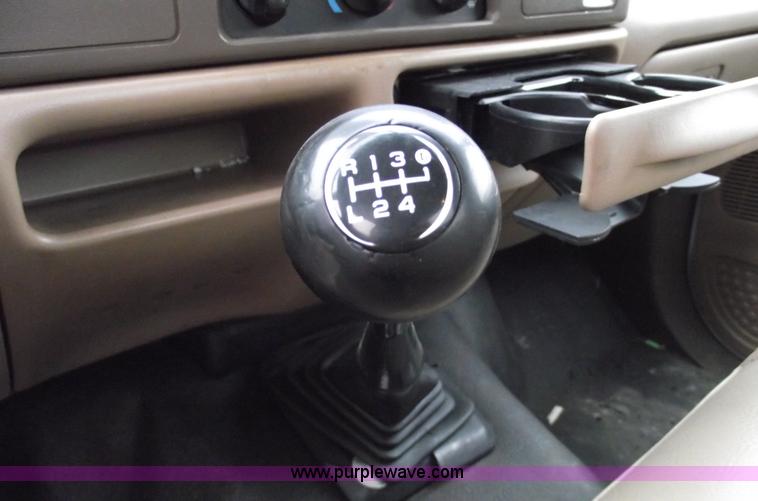 image for item 5452 1999 F450 XL Super Duty flat bed truck