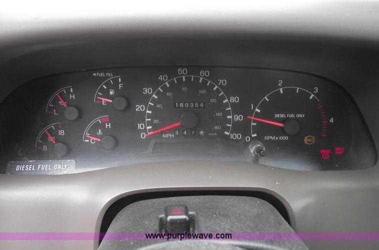 image for item 5452 1999 F450 XL Super Duty flat bed truck