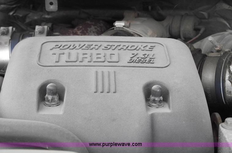 image for item 5452 1999 F450 XL Super Duty flat bed truck