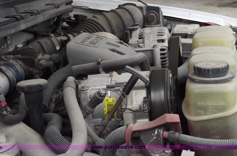 image for item 5452 1999 F450 XL Super Duty flat bed truck