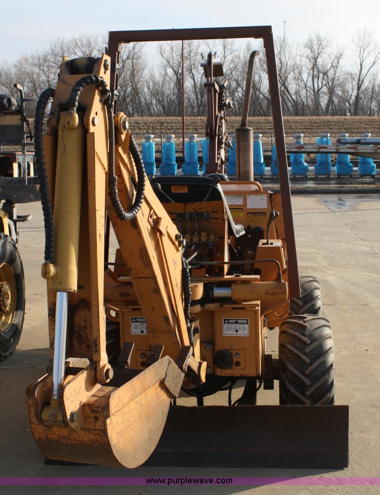image for item 4893 Case 360 trencher backhoe