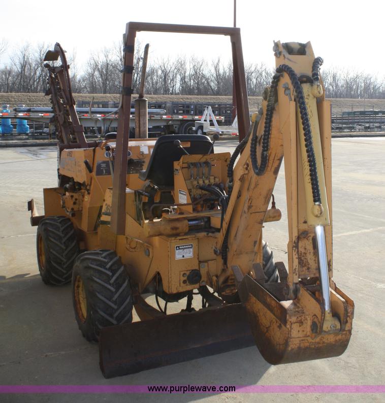 image for item 4893 Case 360 trencher backhoe